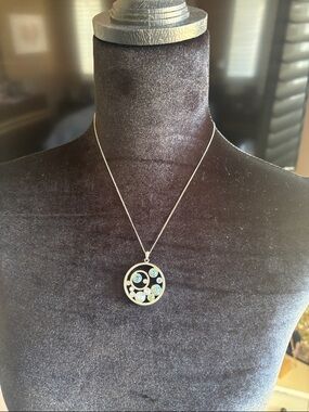 Touchstone Crystal Silver-Tone Circular Pendant with Blue and Green Accents